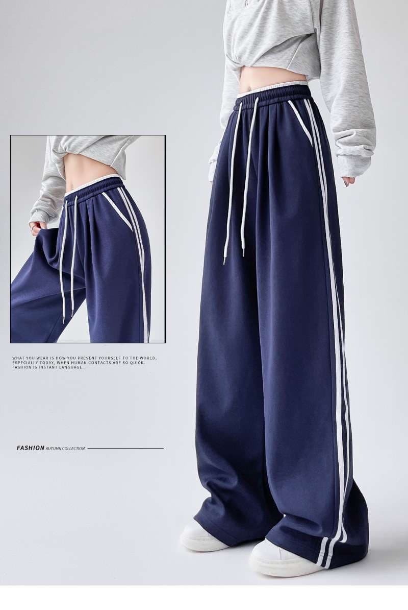 ネイビーコーデ ゆったりストライプスポーティーパンツ
