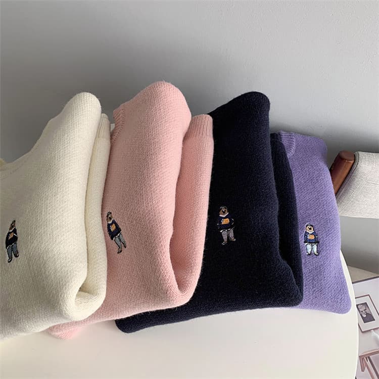 ネイビーコーデ 可愛い刺繍入りゆったり長袖ニットセータートップス